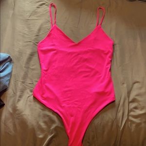 Bright pink bodysuit